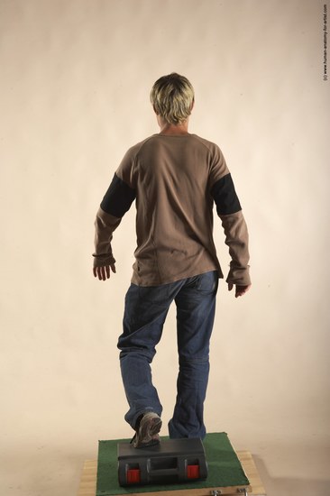 Casual Man White Moving poses Slim Short Brown Academic