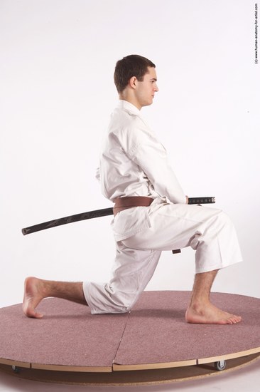 Sportswear Fighting with sword Man White Standing poses - ALL Athletic Short Brown Standing poses - simple Academic