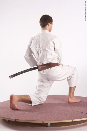 Sportswear Fighting with sword Man White Standing poses - ALL Athletic Short Brown Standing poses - simple Academic