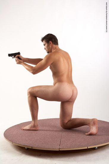 Nude Fighting with gun Man White Kneeling poses - ALL Average Short Brown Kneeling poses - on both knees Realistic