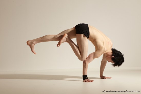 Underwear Gymnastic poses Man White Athletic Short Black Dancing Dynamic poses Academic