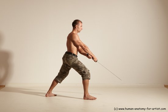 Fighting with sword Man White Moving poses Muscular Short Brown Dynamic poses Academic