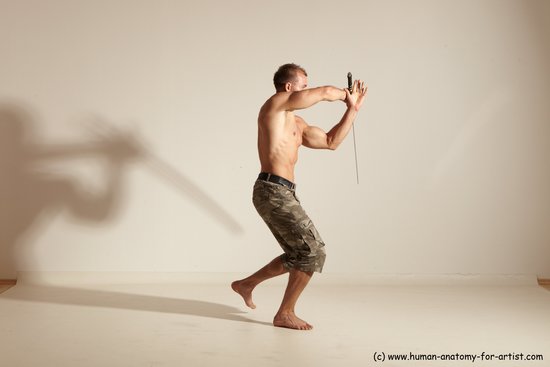 Fighting with sword Man White Moving poses Muscular Short Brown Dynamic poses Academic