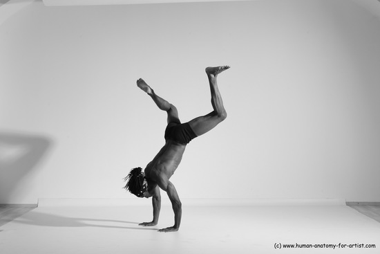 Underwear Gymnastic poses Man Black Athletic Black Dancing Dreadlocks Dynamic poses Academic