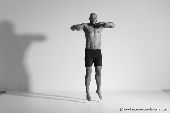 Underwear Gymnastic poses Man Black Muscular Bald Dancing Dynamic poses Academic