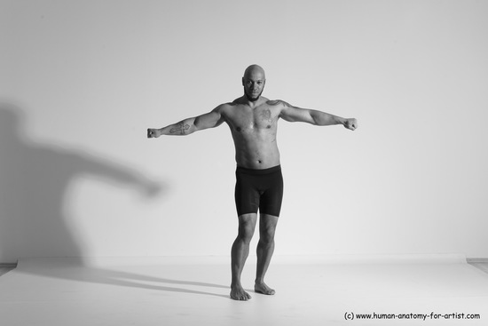 Underwear Gymnastic poses Man Black Muscular Bald Dancing Dynamic poses Academic