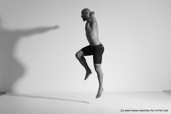 Underwear Gymnastic poses Man Black Muscular Bald Dancing Dynamic poses Academic