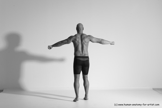 Underwear Gymnastic poses Man Black Muscular Bald Dancing Dynamic poses Academic