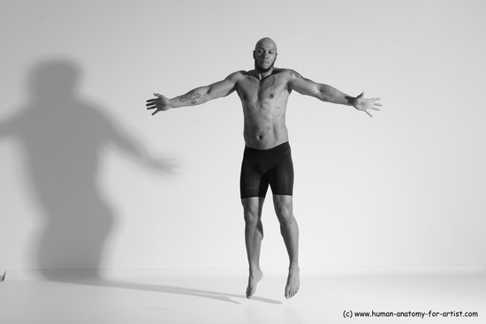 Underwear Gymnastic poses Man Black Muscular Bald Dancing Dynamic poses Academic