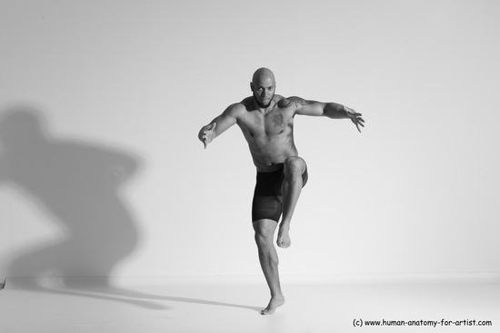 Underwear Gymnastic poses Man Black Muscular Bald Dancing Dynamic poses Academic