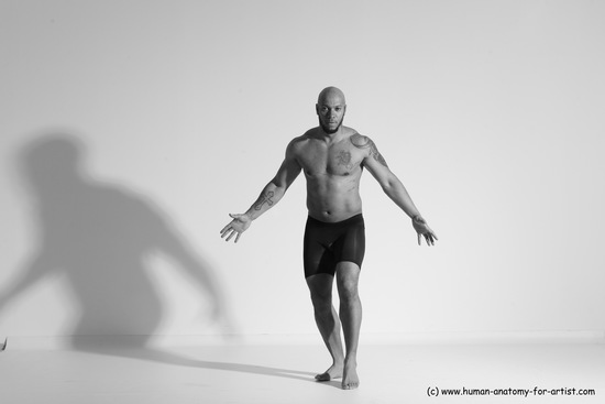 Underwear Gymnastic poses Man Black Muscular Bald Dancing Dynamic poses Academic