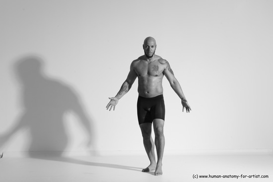 Underwear Gymnastic poses Man Black Muscular Bald Dancing Dynamic poses Academic