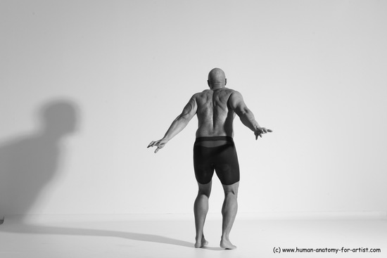 Underwear Gymnastic poses Man Black Muscular Bald Dancing Dynamic poses Academic