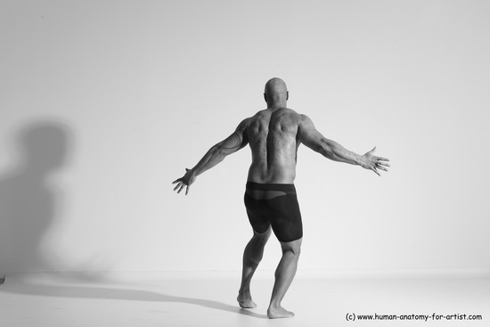 Underwear Gymnastic poses Man Black Muscular Bald Dancing Dynamic poses Academic