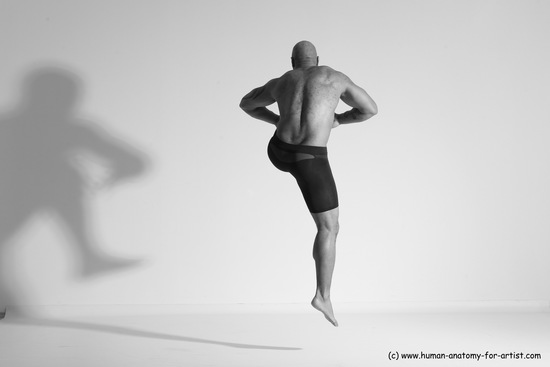 Underwear Gymnastic poses Man Black Muscular Bald Dancing Dynamic poses Academic