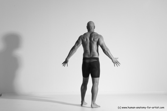 Underwear Gymnastic poses Man Black Muscular Bald Dancing Dynamic poses Academic