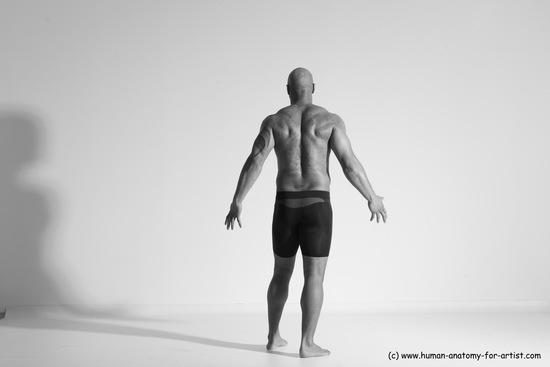 Underwear Gymnastic poses Man Black Muscular Bald Dancing Dynamic poses Academic