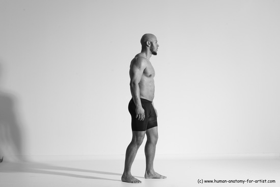 Underwear Gymnastic poses Man Black Muscular Bald Dancing Dynamic poses Academic