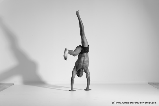 Underwear Gymnastic poses Man Black Athletic Black Dancing Dreadlocks Dynamic poses Academic