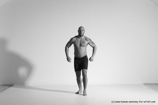 Underwear Gymnastic poses Man Black Muscular Bald Dancing Dynamic poses Academic