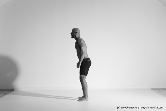 Underwear Gymnastic poses Man Black Muscular Bald Dancing Dynamic poses Academic