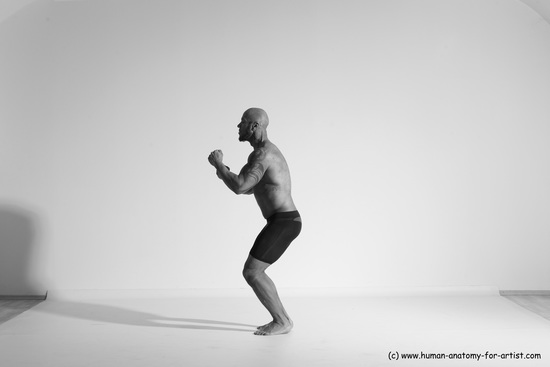 Underwear Gymnastic poses Man Black Muscular Bald Dancing Dynamic poses Academic