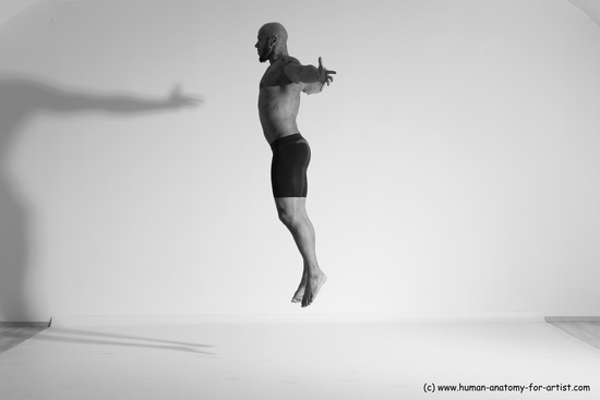 Underwear Gymnastic poses Man Black Muscular Bald Dancing Dynamic poses Academic