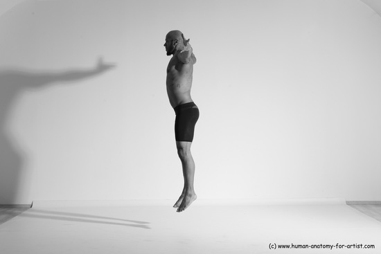 Underwear Gymnastic poses Man Black Muscular Bald Dancing Dynamic poses Academic