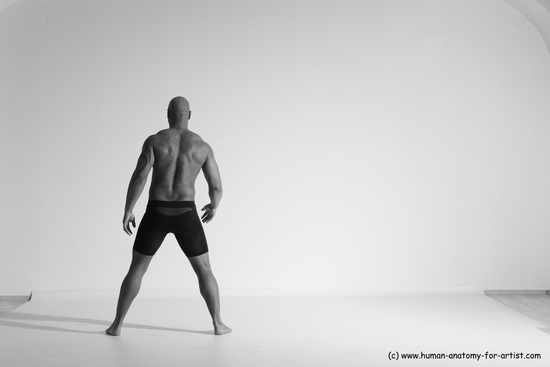 Underwear Gymnastic poses Man Black Muscular Bald Dancing Dynamic poses Academic