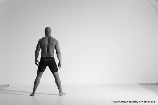 Underwear Gymnastic poses Man Black Muscular Bald Dancing Dynamic poses Academic