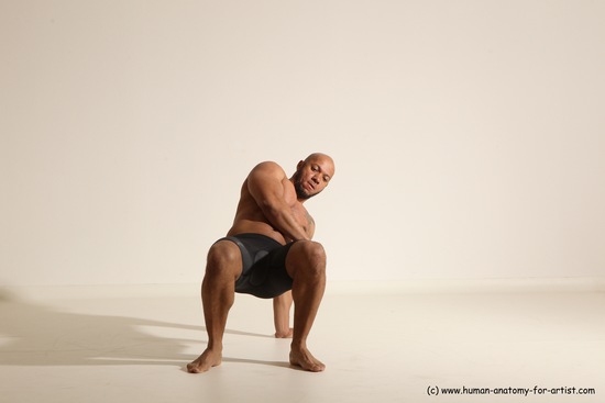 Underwear Gymnastic poses Man Black Muscular Bald Dancing Dynamic poses Academic