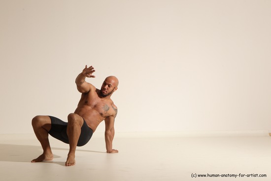 Underwear Gymnastic poses Man Black Muscular Bald Dancing Dynamic poses Academic