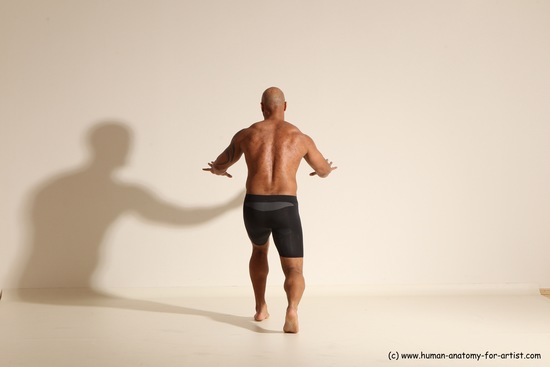 Underwear Gymnastic poses Man Black Muscular Bald Dancing Dynamic poses Academic