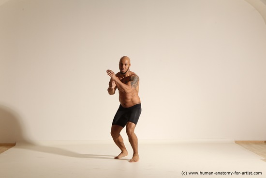 Underwear Gymnastic poses Man Black Muscular Bald Dancing Dynamic poses Academic