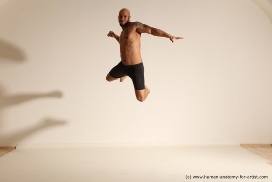 Underwear Gymnastic poses Man Black Muscular Bald Dancing Dynamic poses Academic