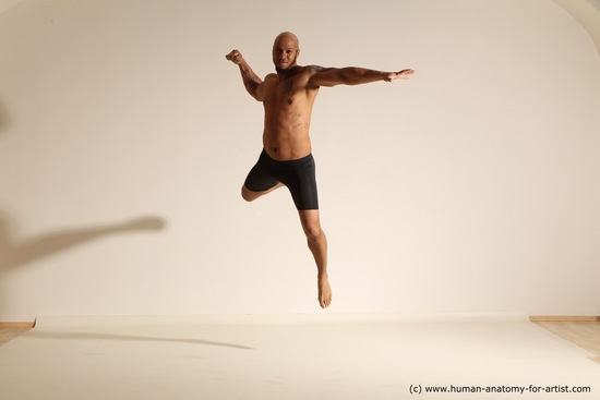 Underwear Gymnastic poses Man Black Muscular Bald Dancing Dynamic poses Academic