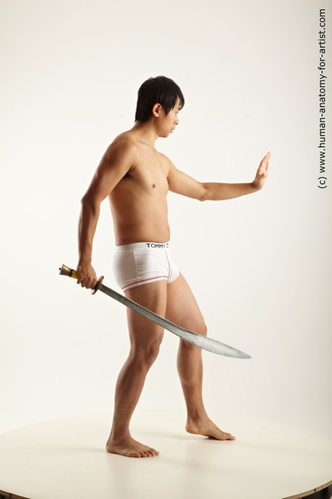 Underwear Fighting with knife Man Asian Average Medium Black Academic