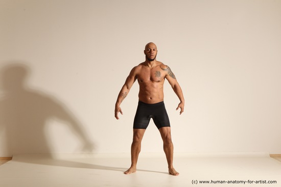 Underwear Gymnastic poses Man Black Muscular Bald Dancing Dynamic poses Academic