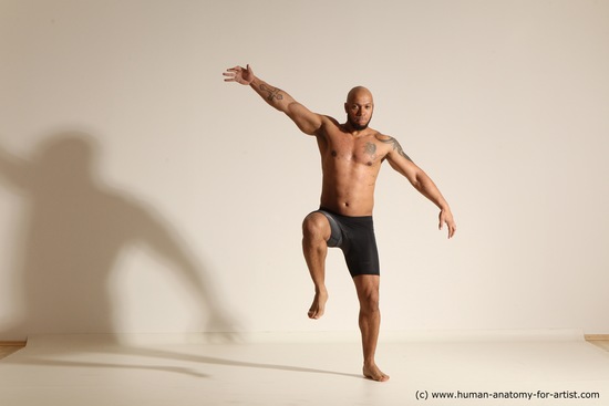 Underwear Gymnastic poses Man Black Muscular Bald Dancing Dynamic poses Academic