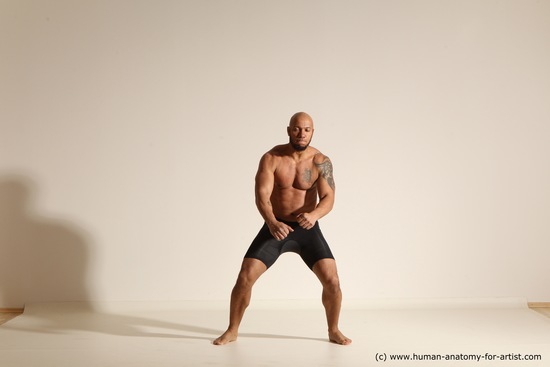 Underwear Gymnastic poses Man Black Muscular Bald Dancing Dynamic poses Academic