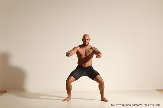 Underwear Gymnastic poses Man Black Muscular Bald Dancing Dynamic poses Academic