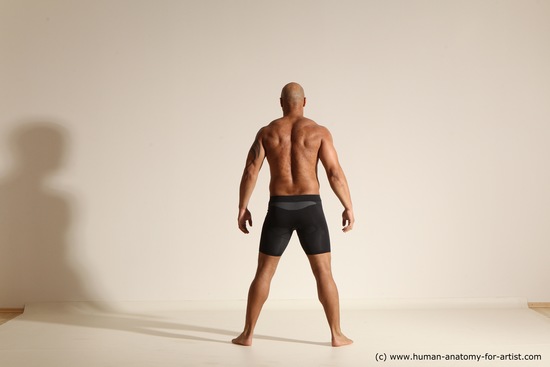 Underwear Gymnastic poses Man Black Muscular Bald Dancing Dynamic poses Academic