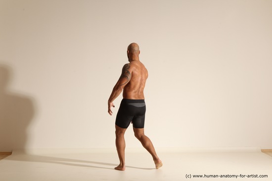 Underwear Gymnastic poses Man Black Muscular Bald Dancing Dynamic poses Academic