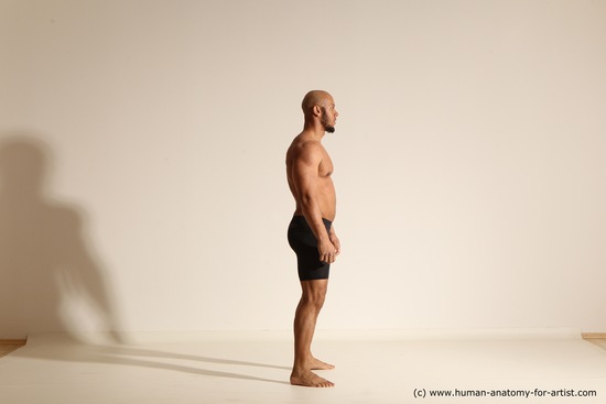 Underwear Gymnastic poses Man Black Muscular Bald Dancing Dynamic poses Academic