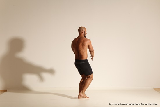 Underwear Gymnastic poses Man Black Muscular Bald Dancing Dynamic poses Academic