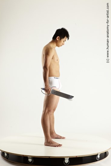 Underwear Fighting with knife Man Asian Average Medium Black Multi angles poses Academic