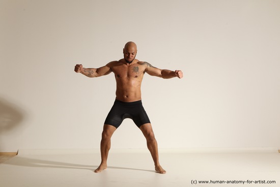 Underwear Gymnastic poses Man Black Muscular Bald Dancing Dynamic poses Academic