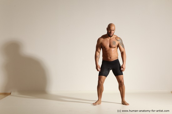 Underwear Gymnastic poses Man Black Muscular Bald Dancing Dynamic poses Academic