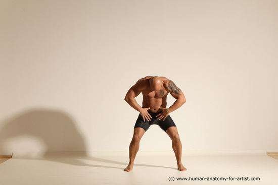 Underwear Gymnastic poses Man Black Muscular Bald Dancing Dynamic poses Academic