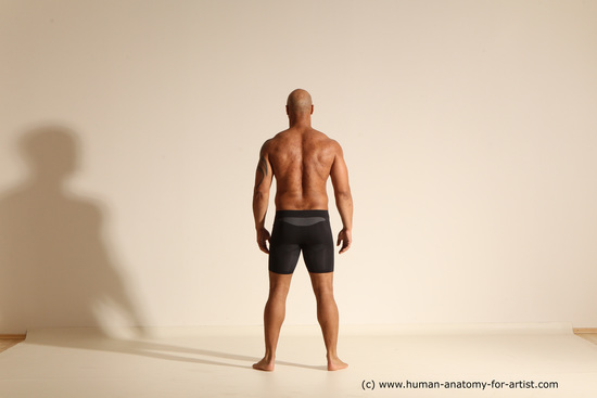 Underwear Gymnastic poses Man Black Muscular Bald Dancing Dynamic poses Academic